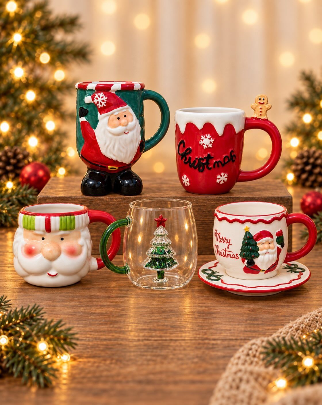 Five festive Christmas mugs featuring Santa and a tree on a wooden table.