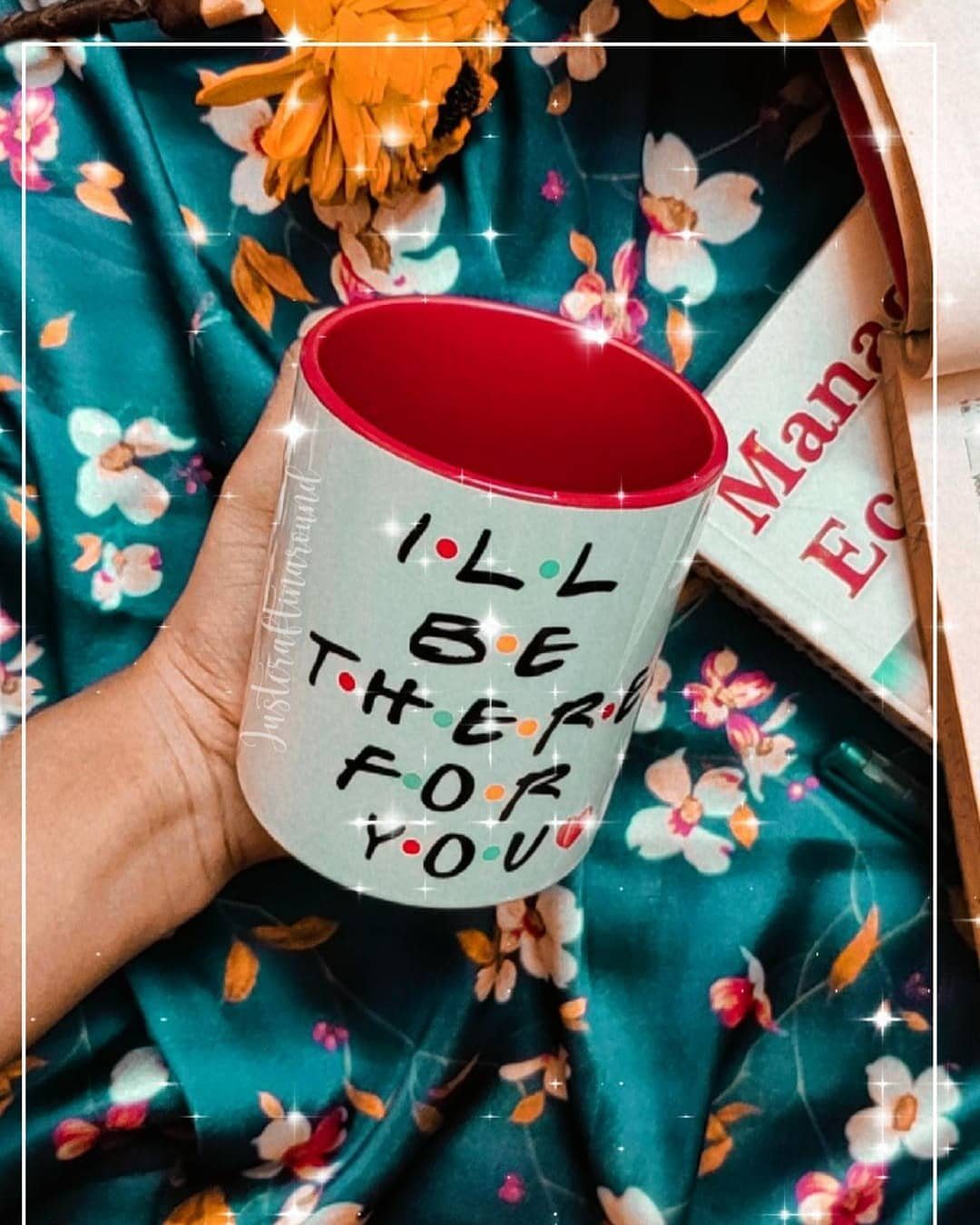 White ceramic mug with red interior and 'I'll be there for you' text.