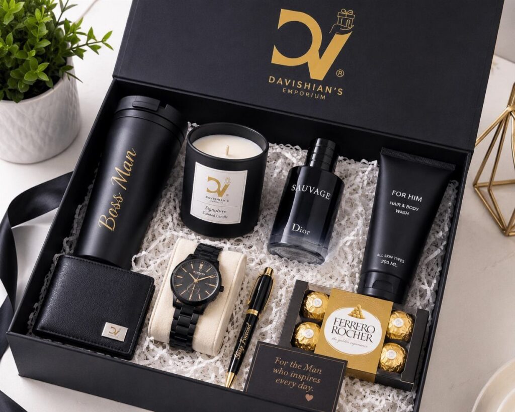 Black gift box containing a Boss Man mug, watch, cologne, and chocolates.